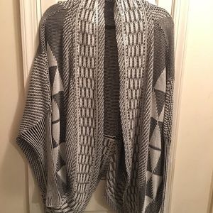 Fashionable black and white cardigan